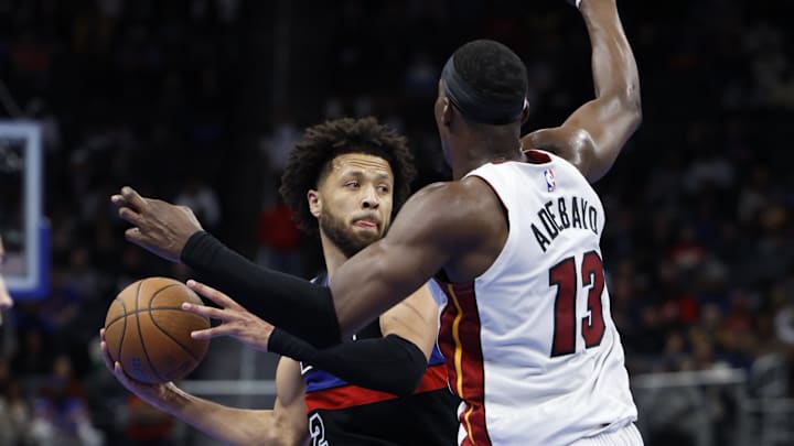 Nov 12, 2024; Detroit, Michigan, USA; Detroit Pistons guard Cade Cunningham (2) dribbles defended by Miami Heat center Bam Adebayo (13) in overtime at Little Caesars Arena. Mandatory Credit: Rick Osentoski-Imagn Images Nov 12, 2024; Detroit, Michigan, USA; Detroit Pistons guard Cade Cunningham (2) dribbles defended by Miami Heat center Bam Adebayo (13) in overtime at Little Caesars Arena. Mandatory Credit: Rick Osentoski-Imagn Images