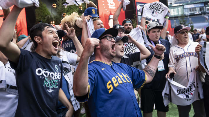 Seattle Mariners fans gather and cheer before the team's pick during the 2023 MLB Draft at Lumen Field in Seattle. Seattle Mariners fans gather and cheer before the team's pick during the 2023 MLB Draft at Lumen Field in Seattle.