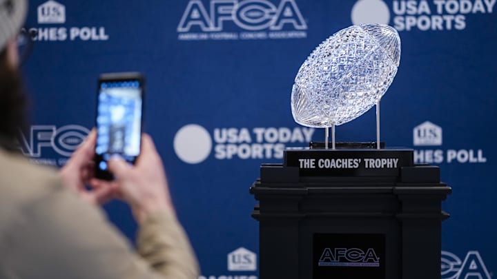 The AFCA Coaches' Trophy sits on display at the Ohio Union on Ohio State University's campus. The Buckeyes football team will be presented with the trophy on Sunday as winners of the USA TODAY Sports and the American Football Coaches Association 2024 US LBM Coaches Poll. The AFCA Coaches' Trophy sits on display at the Ohio Union on Ohio State University's campus. The Buckeyes football team will be presented with the trophy on Sunday as winners of the USA TODAY Sports and the American Football Coaches Association 2024 US LBM Coaches Poll.