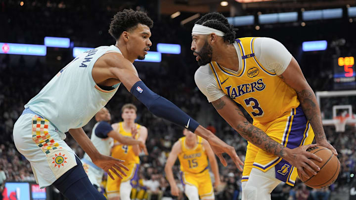 Nov 27, 2024; San Antonio, Texas, USA;  Los Angeles Lakers forward Anthony Davis (3) faces off against San Antonio Spurs center Victor Wembanyama (1) in the second half at Frost Bank Center. Mandatory Credit: Daniel Dunn-Imagn Images