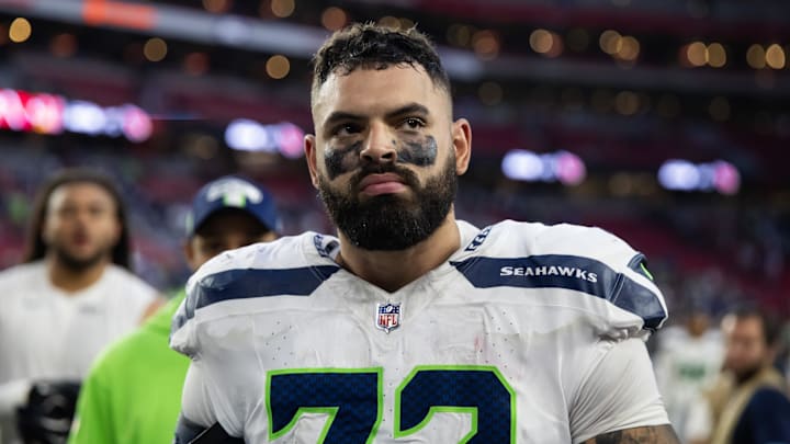 Dec 8, 2024; Glendale, Arizona, USA; Seattle Seahawks offensive tackle Abraham Lucas (72) against the Arizona Cardinals at State Farm Stadium. Mandatory Credit: Mark J. Rebilas-Imagn Images