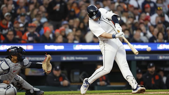 Oct 10, 2024; Detroit, Michigan, USA; Detroit Tigers first base Spencer Torkelson (20) hits a single in the second inning against the Cleveland Guardians during game four of the ALDS for the 2024 MLB Playoffs at Comerica Park. 