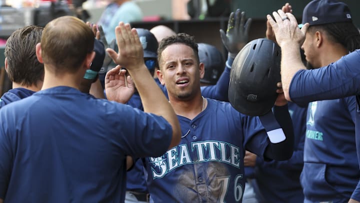Seattle Mariners second baseman Leo Rivas (76) celebrates after scoring during a game against the Texas Rangers on May 4 at Globe Life Field. Seattle Mariners second baseman Leo Rivas (76) celebrates after scoring during a game against the Texas Rangers on May 4 at Globe Life Field.