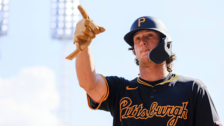 Sep 21, 2024; Cincinnati, Ohio, USA; Pittsburgh Pirates outfielder Billy Cook (28) reacts after hitting a solo home run in the ninth inning against the Cincinnati Reds at Great American Ball Park. Mandatory Credit: Katie Stratman-Imagn Images