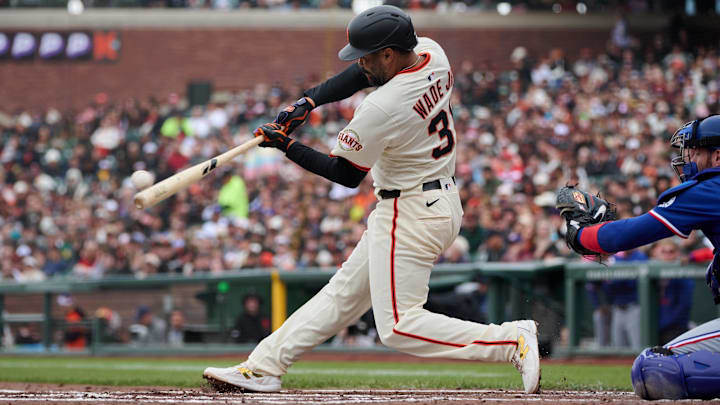 Apr 27, 2025; San Francisco, California, USA; San Francisco Giants first baseman LaMonte Wade Jr. (31) bats against the Texas Rangers during the first inning at Oracle Park.