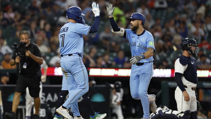 Jul 24, 2025; Detroit, Michigan, USA; Toronto Blue Jays outfielder Nathan Lukes (38) celebrates after hitting a two-run homerun with Toronto Blue Jays third baseman Will Wagner (7) in the eighth inning tn the eighth inning against the Detroit Tigers at Comerica Park. 
