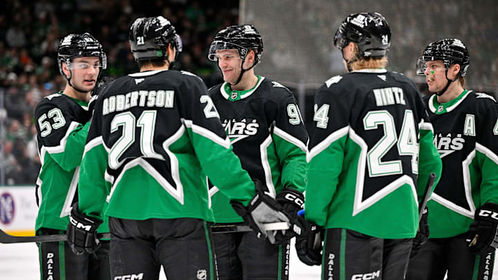 Jan 18, 2026; Dallas, Texas, USA; Dallas Stars center Wyatt Johnston (53) and left wing Jason Robertson (21) and right wing Mikko Rantanen (96) and center Roope Hintz (24) and defenseman Miro Heiskanen (4) huddle before a power play during the game against the Tampa Bay Lightning at the American Airlines Center. Mandatory Credit: Jerome Miron-Imagn Images