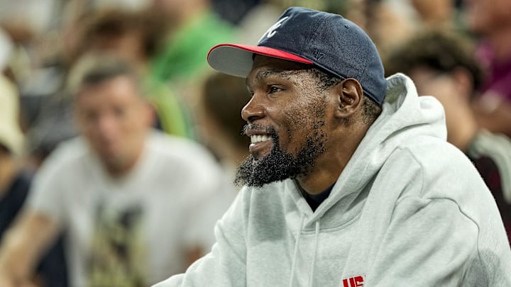 Aug 9, 2024; Paris, France; Kevin Durant watches during a women's basketball semifinal game during the Paris 2024 Olympic Summer Games at Accor Arena. Mandatory Credit: Kyle Terada-Imagn Images
