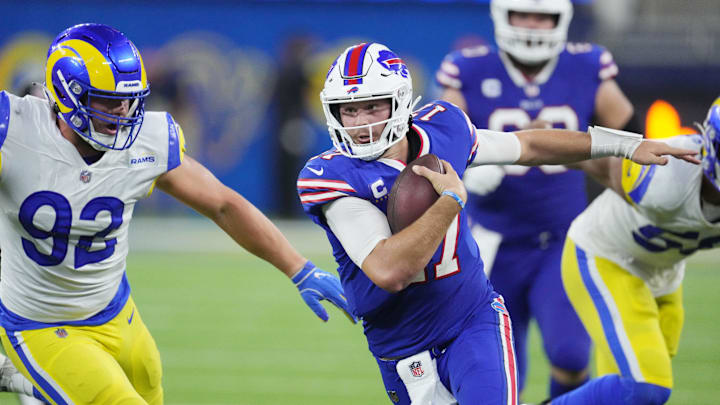 Sep 8, 2022; Inglewood, California, USA; Buffalo Bills quarterback Josh Allen (17) runs the ball against the Los Angeles Rams at SoFi 