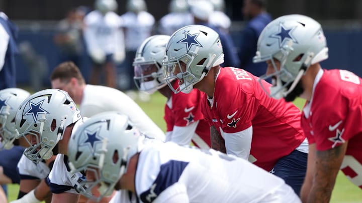  Dallas Cowboys quarterback Dak Prescott takes the snap during training camp at the River Ridge Fields in Oxnard. 