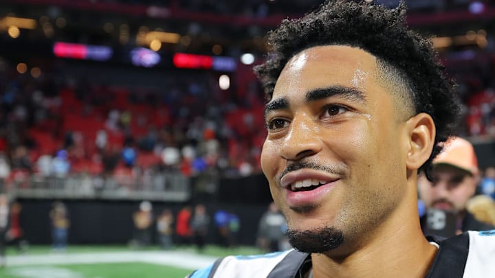 ATLANTA, GEORGIA - JANUARY 05: Bryce Young #9 of the Carolina Panthers celebrates after defeating the Atlanta Falcons 44-38 at Mercedes-Benz Stadium on January 05, 2025 in Atlanta, Georgia. 