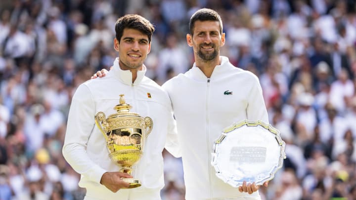 Carlos Alcaraz and Novak Djokovic at Wimbledon on July 14, 2024.