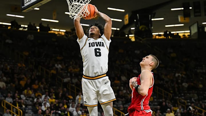 Iowa Hawkeyes guard Tavion Banks throwing down a dunk against the Robert Morris Colonials