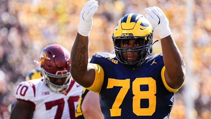 Michigan defensive lineman Kenneth Grant (78) celebrates a tackle against USC during the first half at Michigan Stadium in Ann Arbor on Saturday, Sept. 21, 2024.
