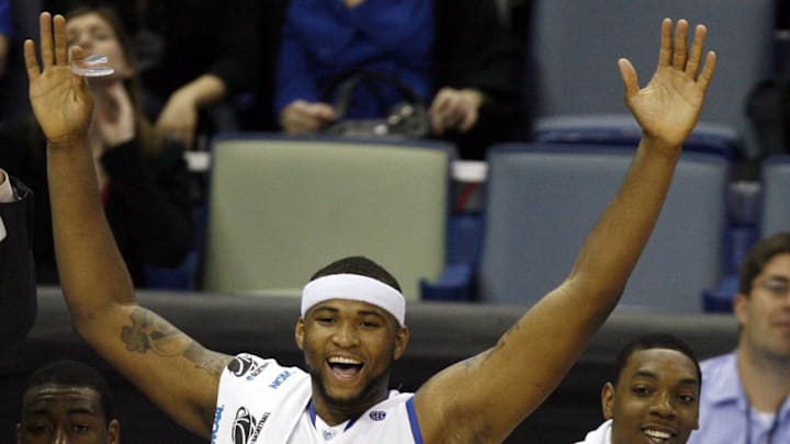 Mar 18, 2010; New Orleans, LA, USA; Kentucky Wildcats guard John Wall (11) and forward DeMarcus Cousins (15) and forward Patrick Patterson (54) react from the bench near the end of the game against the East Tennessee Buccaneers in the first round of the 2010 NCAA mens basketball tournament at the New Orleans Arena. Kentucky won 100-71.Mandatory Credit: Crystal LoGiudice-Imagn Images