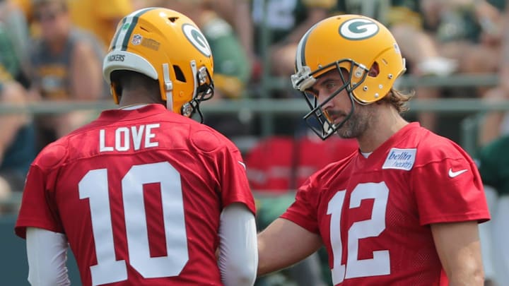 Aaron Rodgers and Jordan Love during training camp with the Packers in 2021.
