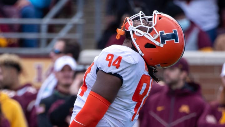 Nov 6, 2021; Minneapolis, Minnesota, USA; Illinois Fighting Illini defensive lineman Jer'Zhan Newton (94) reacts during the fourth quarter against the Minnesota Golden Gophers at Huntington Bank Stadium. Mandatory Credit: Matt Krohn-USA TODAY Sports