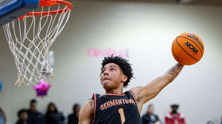 Germantown's Mike Williams brings the ball to the basket during the game against Murrah in January.