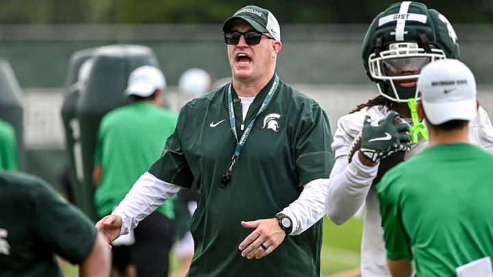 Michigan State’s head coach Pat Fitzgerald calls out to players during football practice on Thursday, Aug. 6, 2026, in East Lansing.