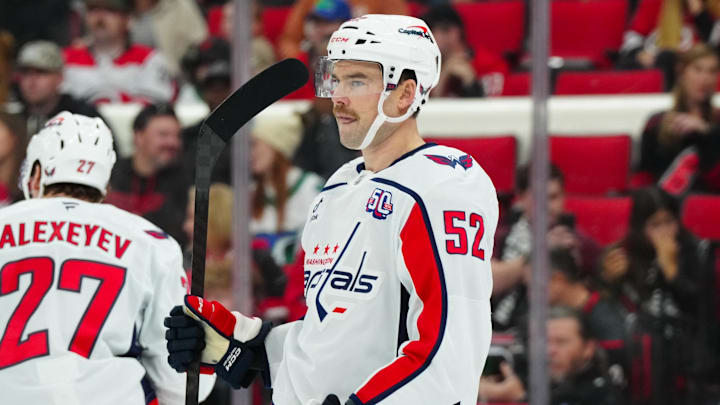 Nov 3, 2024; Raleigh, North Carolina, USA; Washington Capitals defenseman Dylan McIlrath (52) looks on against the Carolina Hurricanes during the first period at Lenovo Center. Mandatory Credit: James Guillory-Imagn Images Nov 3, 2024; Raleigh, North Carolina, USA; Washington Capitals defenseman Dylan McIlrath (52) looks on against the Carolina Hurricanes during the first period at Lenovo Center. Mandatory Credit: James Guillory-Imagn Images