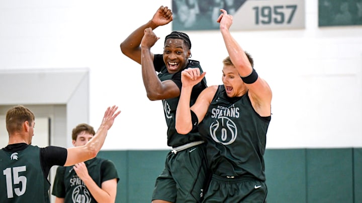 Michigan State's Cam Ward, left, and Jaxon Kohler celebrate during the first day of basketball practice on Monday, Sept. 22, 2025, at the Breslin Center in East Lansing.