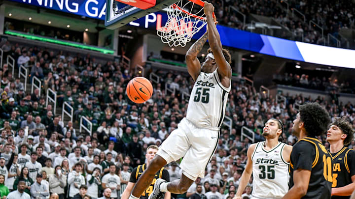 Michigan State's Coen Carr dunks against Iowa during the second half on Tuesday, Dec. 2, 2025, at the Breslin Center in East Lansing.