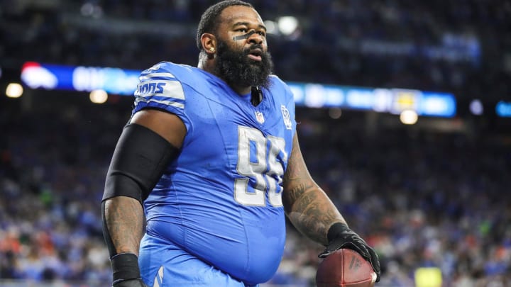 Detroit Lions defensive end Isaiah Buggs (96) walks off the field after recovering the fumble from Denver Broncos quarterback Russell Wilson (3) during the first half at Ford Field in Detroit on Saturday, Dec. 16, 2023. Detroit Lions defensive end Isaiah Buggs (96) walks off the field after recovering the fumble from Denver Broncos quarterback Russell Wilson (3) during the first half at Ford Field in Detroit on Saturday, Dec. 16, 2023.