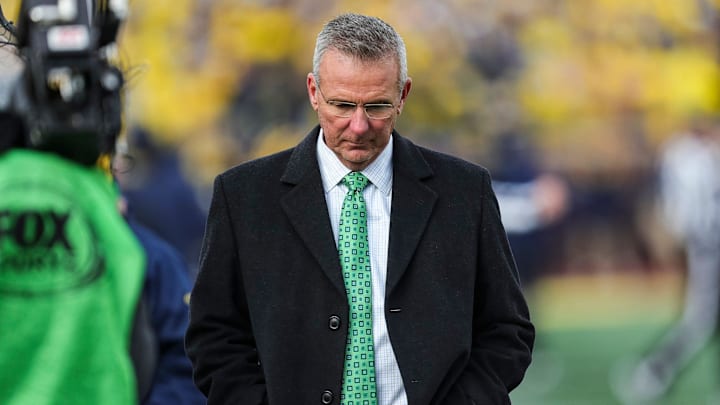 Former Ohio State head coach Urban Meyer walks down the sideline during the second half at Michigan Stadium in Ann Arbor on Saturday, Nov. 25, 2023.