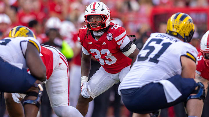 Nebraska linebacker Marques Watson-Trent prepares to defend Michigan.