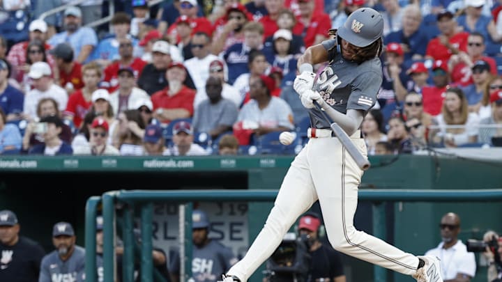 Sep 28, 2024; Washington, District of Columbia, USA; Washington Nationals outfielder James Wood (29) hits a two run home run against the Philadelphia Phillies during the sixth inning at Nationals Park. 