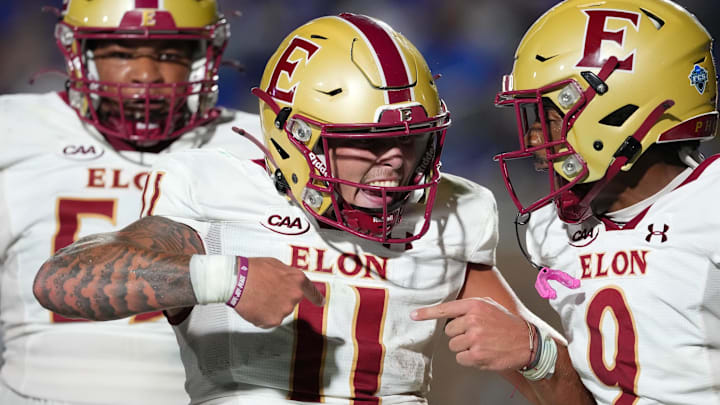 Aug 28, 2025; Durham, North Carolina, USA; Elon Phoenix quarterback Landen Clark (11) celebrates his touchdown run with wide receiver Kenaz McMillian (9) against the Duke Blue Devils during the first half at Wallace Wade Stadium. Mandatory Credit: James Guillory-Imagn Images Aug 28, 2025; Durham, North Carolina, USA; Elon Phoenix quarterback Landen Clark (11) celebrates his touchdown run with wide receiver Kenaz McMillian (9) against the Duke Blue Devils during the first half at Wallace Wade Stadium. Mandatory Credit: James Guillory-Imagn Images