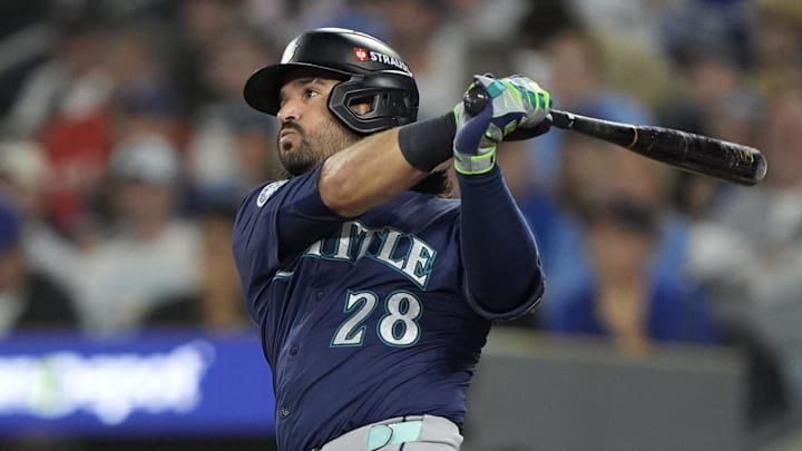 Oct 20, 2025; Toronto, Ontario, CAN; Seattle Mariners third baseman Eugenio Suarez (28) hits a single against the Toronto Blue Jays in the second inning during game seven of the ALCS round for the 2025 MLB playoffs at Rogers Centre.  Mandatory Credit: John E. Sokolowski-Imagn Images