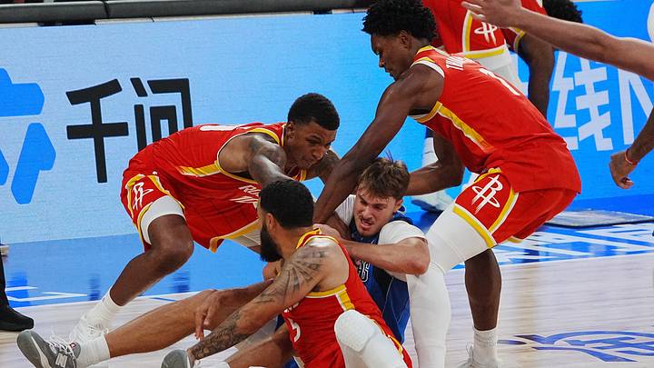 Basketball - NBA - Preseason - China Games 2026 - Dallas Mavericks v Houston Rockets - The Venetian Arena, Macao, China - October 9, 2026 Dallas Mavericks' Cooper Flagg in action with Houston Rockets' Fred VanVleet REUTERS/Lam Yik
