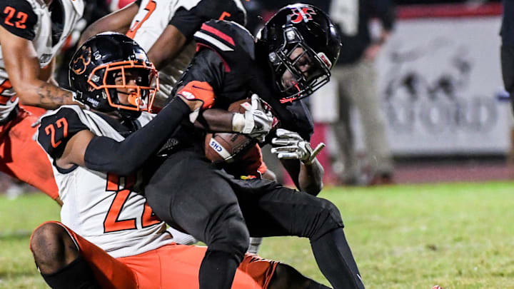 Jamare Dorsey of South Sumter is tackled by CJ Hester of Cocoa during their game in the FHSAA football Class 2S regional final. Craig Bailey/FLORIDA TODAY via USA TODAY NETWORK
High School Football Cocoa Vs South Sumter Jamare Dorsey of South Sumter is tackled by CJ Hester of Cocoa during their game in the FHSAA football Class 2S regional final. Craig Bailey/FLORIDA TODAY via USA TODAY NETWORK
High School Football Cocoa Vs South Sumter