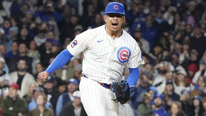May 28, 2025; Chicago, Illinois, USA; Chicago Cubs pitcher Daniel Palencia (48) reacts after getting the final out against the Colorado Rockies during the ninth inning at Wrigley Field. 