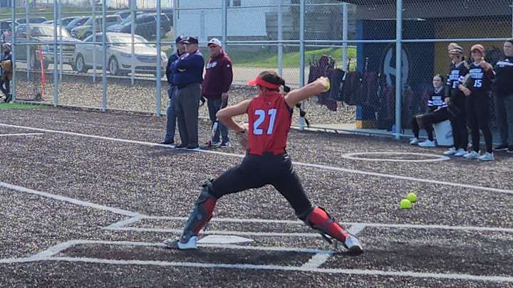 Canfield catcher Leah Figueroa warms up prior to a game on April 13, 2024.