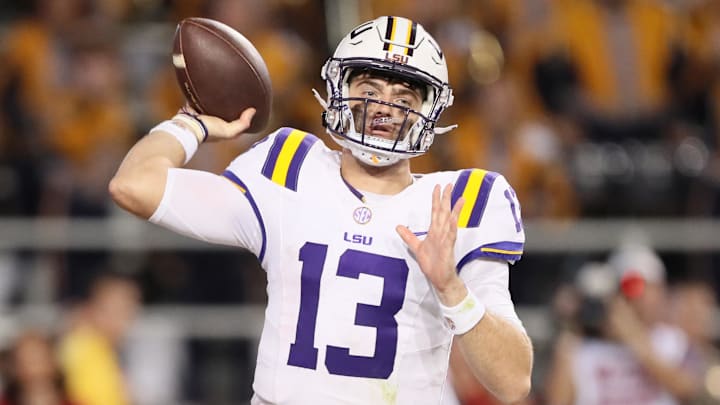 Oct 19, 2024; Fayetteville, Arkansas, USA; LSU Tigers quarterback Garrett Nussmeier (13) passes in the second quarter against the Arkansas Razorbacks at Donald W. Reynolds Razorback Stadium. Mandatory Credit: Nelson Chenault-Imagn Images