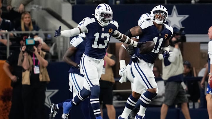  Dallas Cowboys linebacker DeMarvion Overshown celebrates after a touchdown interception against the New York Giants.