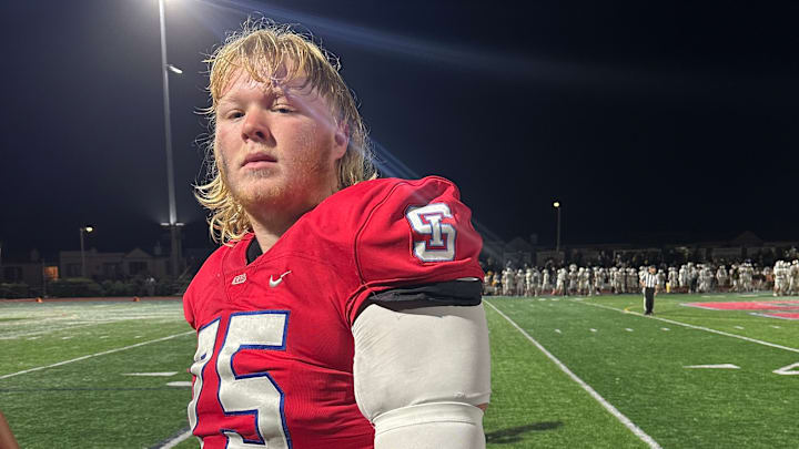 John Mills has flipped his recruiting commitment from Texas to the UW. 