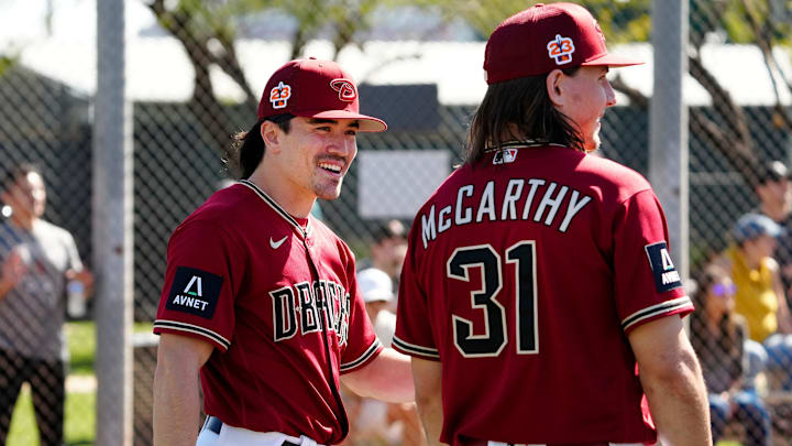 Feb 20, 2023; Scottsdale, AZ, USA; Arizona Diamondbacks outfielder Corbin Carroll and outfielder Jake McCarthy. 
