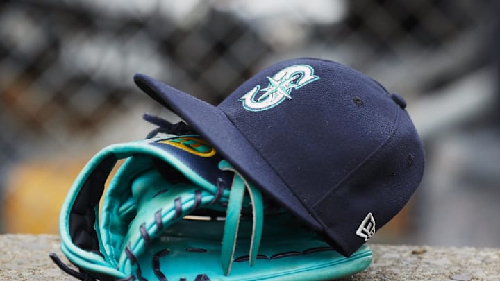 May 12, 2018; Detroit, MI, USA; Hat and glove of Seattle Mariners center fielder Dee Gordon (9) sits in dugout during the third inning against the Detroit Tigers at Comerica Park. Mandatory Credit: Rick Osentoski-Imagn Images