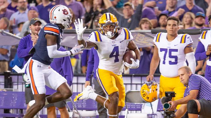 LSU runningback John Emery Jr 4 runs the ball as the LSU Tigers take on the Auburn Tigers at Tiger Stadium in Baton Rouge, Louisiana, Saturday, Oct. 14, 2023.