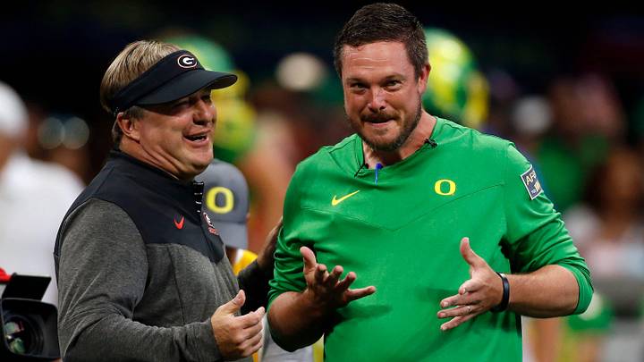 Georgia head coach Kirby Smart and Oregon head coach Dan Lanning meet during warm ups before the start of the Chick-fil-A Kickoff NCAA college football game between Oregon and Georgia in Atlanta, on Saturday, Sept. 3, 2022.

News Joshua L Jones