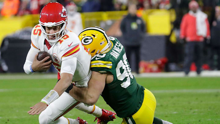 Green Bay Packers linebacker Lukas Van Ness (90) sacks Kansas City Chiefs quarterback Patrick