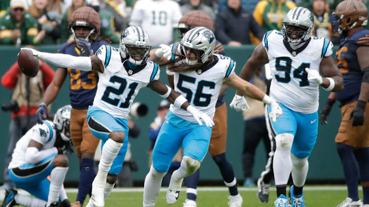 Carolina Panthers safety Nick Scott (21) celebrates recovering a fumble by Green Bay Packers wide receiver Savion Williams (83) during their football game Sunday, November 2, 2025, at Lambeau Field in Green Bay, Wisconsin.