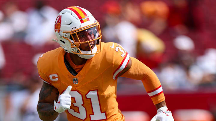 Oct 27, 2024; Tampa, Florida, USA; Tampa Bay Buccaneers safety Antoine Winfield Jr. (31) warms up before a game against the Atlanta Falcons at Raymond James Stadium. Mandatory Credit: Nathan Ray Seebeck-Imagn Images Oct 27, 2024; Tampa, Florida, USA; Tampa Bay Buccaneers safety Antoine Winfield Jr. (31) warms up before a game against the Atlanta Falcons at Raymond James Stadium. Mandatory Credit: Nathan Ray Seebeck-Imagn Images