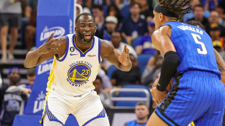 Golden State Warriors forward Draymond Green (23) reacts during the first quarter against the Orlando Magic at Amway Center.