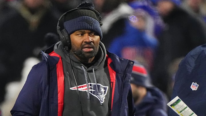 Dec 22, 2024; Orchard Park, New York, USA; New England Patriots heac coach Jerod Mayo looks on from the sideline during the first half against the Buffalo Bills at Highmark Stadium. Mandatory Credit: Gregory Fisher-Imagn Images