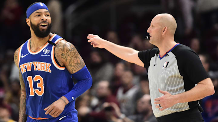 Feb 3, 2020; Cleveland, Ohio, USA; New York Knicks forward Marcus Morris Sr. (13) celebrates as referee Eric Dalen signals a three point basket during overtime against the Cleveland Cavaliers at Rocket Mortgage FieldHouse. Mandatory Credit: Ken Blaze-Imagn Images Feb 3, 2020; Cleveland, Ohio, USA; New York Knicks forward Marcus Morris Sr. (13) celebrates as referee Eric Dalen signals a three point basket during overtime against the Cleveland Cavaliers at Rocket Mortgage FieldHouse. Mandatory Credit: Ken Blaze-Imagn Images