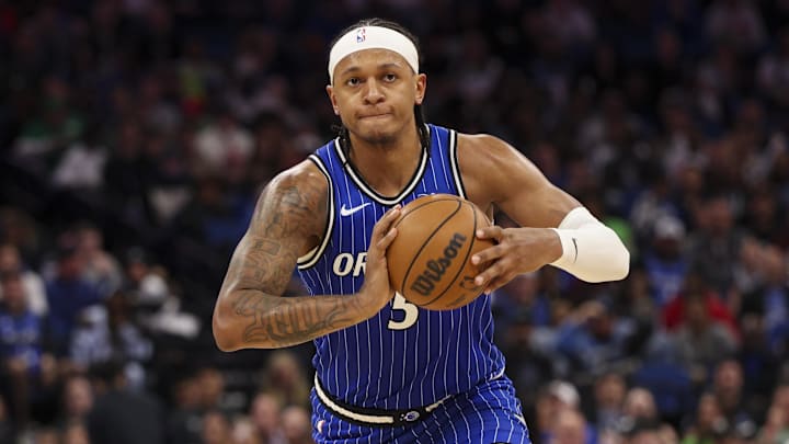 Mar 17, 2026; Orlando, Florida, USA; Orlando Magic forward Paolo Banchero (5) passes the ball against the Oklahoma City Thunder in the second quarter at Kia Center. Mandatory Credit: Nathan Ray Seebeck-Imagn Images